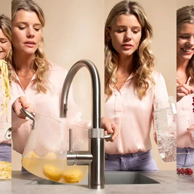 Frau die mit einem Quooker Flex einen Topf auffüllt